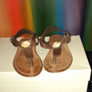 Brown Sandals with Thin Straps and Decorative Design